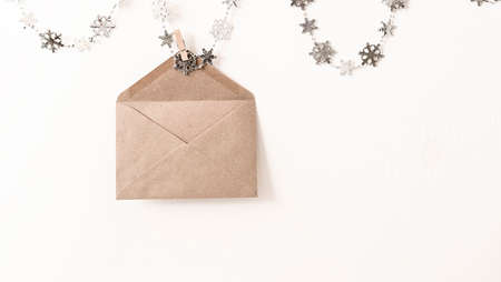 hanging envelope eco-friendly paper white background with a place for textの写真素材
