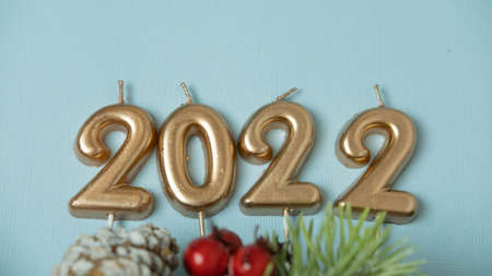 figures 2022 on a blue background , the concept of Christmas and medicineの写真素材