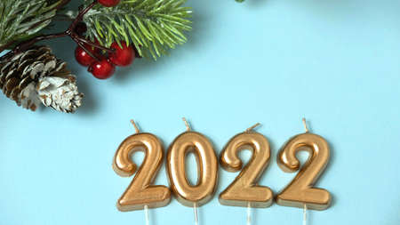 figures 2022 on a blue background , the concept of Christmas and medicineの写真素材