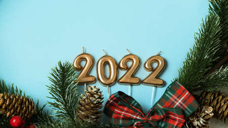 figures 2022 on a blue background , the concept of Christmas and medicineの写真素材