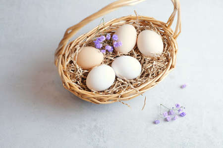 easter composition on a light concrete background, easter conceptの写真素材