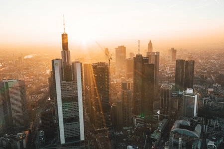 Incredible View of Frankfurt am Main, Germany Skyline in on Hazy Winter morning in Beautiful Sunrise...