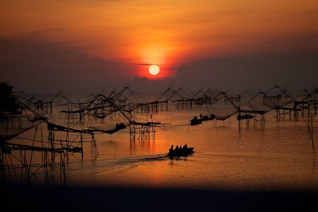 Chinese fishing nets with sunset viewの写真素材