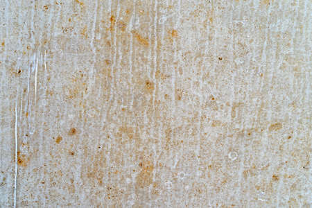 Aged concrete with orange patterns and cracks - high quality texture / backgroundの写真素材