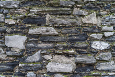 Vintage rustic stone wall - high quality texture / backgroundの写真素材