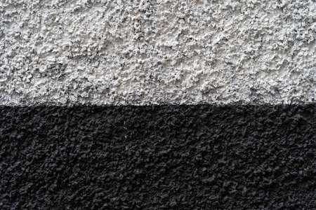 Black and white stripes on aged plaster with patterns and cracks - high quality texture / backgroundの写真素材