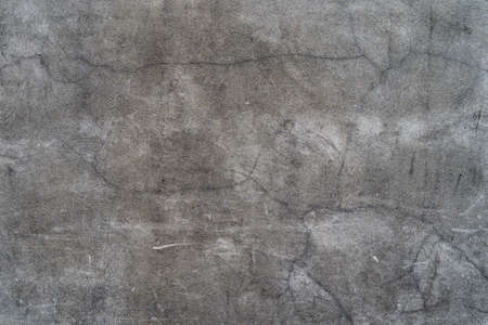 Aged concrete with patterns and cracks - high quality texture / backgroundの写真素材