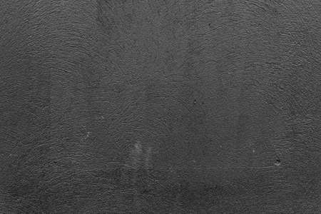 Aged dark gray plaster with patterns and cracks - high quality texture / backgroundの写真素材