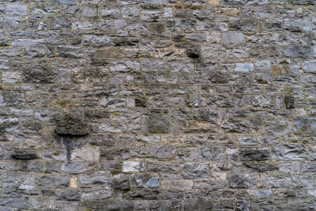 Grungy large stone wall - high quality texture / backgroundの写真素材
