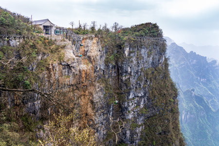 Cable way cart station, carts going up and down, tourists walking on the Sky Walk at Tianmen Mountain, Zhangjiajie, Hunan, Chinaの写真素材
