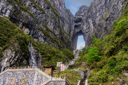 Zhangjiajie, Hunan, China Apr 2013 Tourists climbing 999 stairs to Haven Gate in Tianman Mountains....