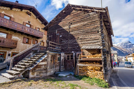 Livigno, Italy, April 2016 Traditional Alpine wooden architecture in the village, wooden house, Livigno is a ski centre for Italian Alpsのeditorial素材