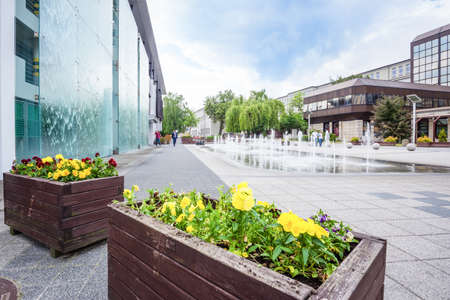 Kielce, Swietokrzyskie, Poland, June 2016 Manmade waterfall from building and ground fountains near ZUS building in Kielceのeditorial素材