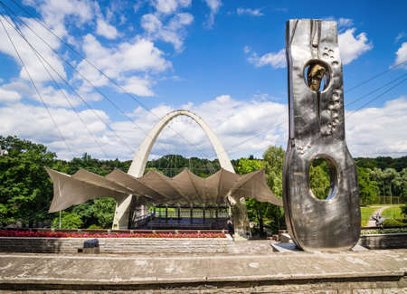 Szczecin, Poland, June 2016 Amphitheatre or Summer Theatre them. Heleny Majdaniec at a Kasprowicz Park with large silver sculpture on sideのeditorial素材