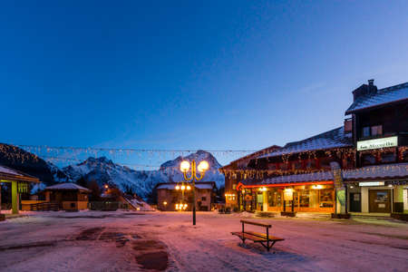 Les deux Alpes, Alps, France, January 2017 Nightlife in alpine village with traditional wooden houses, shops and restaurants. Popular ski destinationのeditorial素材