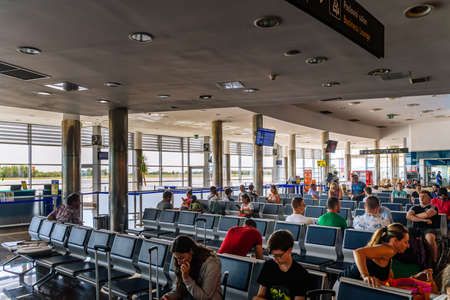 Zadar, Croatia, August 2019 Passengers waiting in departure hall in Zadar International Airport for their flights home or for holidaysのeditorial素材