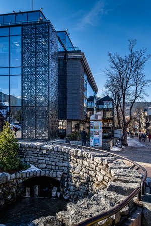 Zakopane, Poland, March 2019 Famous Krupowki promenade, main shopping area in Zakopane. Winter time. Zakopane is called a winter capital of Polandのeditorial素材