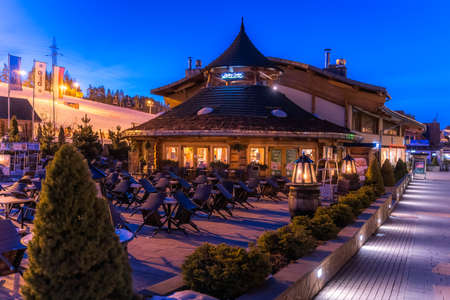 Bialka Tatrzanska, Poland, March 2019 Restaurants and shopping area in ski lift Bania at night time. Popular winter sports village in Tatra Mountainsのeditorial素材