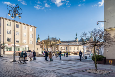 Kielce, Poland, March 2019 Busy promenade, Henryka Sienkiewicza street in Kielce with groups of...