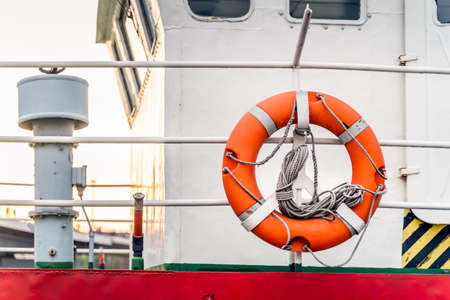 Close up on lifebuoys equipped on fireboat or firefighter ship. Anchored on Rampart of Brave pier in Szczecin, Polandの写真素材