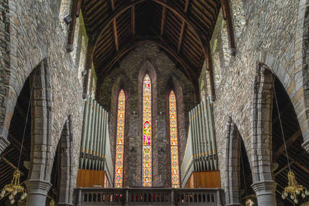 Killarney, Ireland, August 2019 Interior, pipe organs and stained glass in St. Marys Cathedralのeditorial素材
