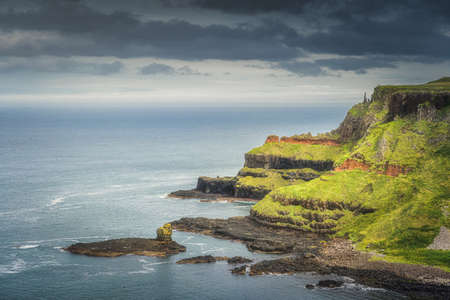 Amazing rock formations and cliffs in Giants Causeway, seen from top of the cliff, Wild Atlantic Way, Northern Irelandの写真素材