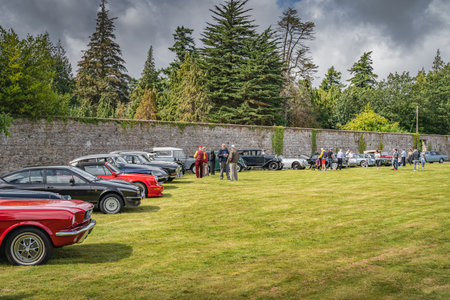 Wicklow, Ireland, August 2019 Irish Veteran and Vintage Car Club in Powerscourt, people admiring beautiful vintage carsの写真素材