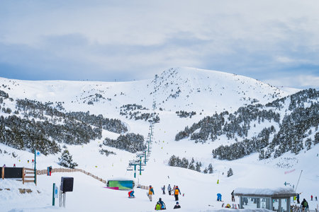 El Tarter, Andorra, January 2020 Group of people, skiers and snowboarders taking on ski lift in Pyrenees Mountains, Grandvaliraのeditorial素材
