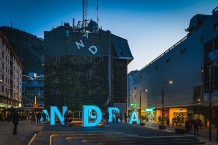 Andorra la Vella, Jan 2020 People taking pictures of iconic neon letters forming sign Andorra at night, Pyrenees Mountainsのeditorial素材