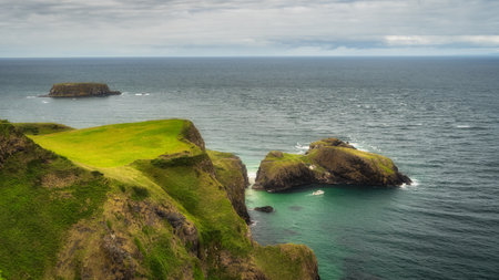 Carrick a Rede rope bridge connecting mainland and small island. Causeway Coast and Wild Atlantic Way, County Antrim, Northern Irelandの写真素材