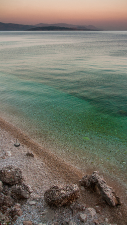 Sunset on beach on Corfu Islandの写真素材