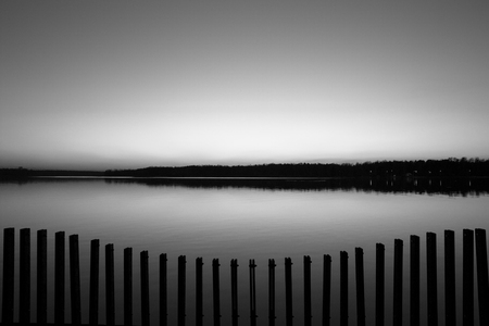 A romantic sunset view over the lakeの写真素材