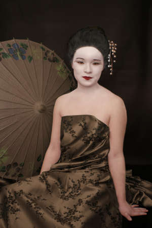 Giesha, with Umbrella Prop and silk wrap の写真素材