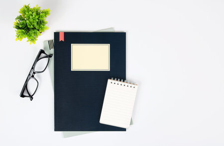 Office desk table with supplies. Top view.の写真素材