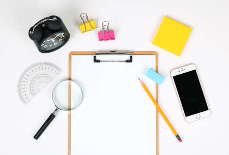 Office desk table with supplies. Top view.の写真素材