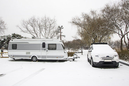 car camping winter in the snowの写真素材
