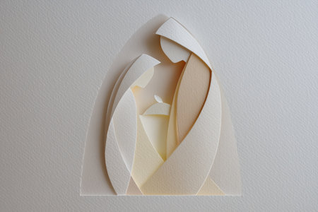 Elegant layered paper cut Nativity scene in neutral tones for Christmas and spiritual themes.の素材