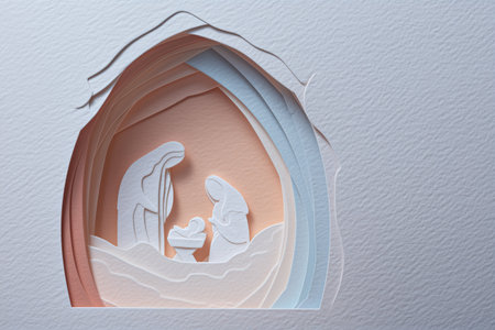 Beautiful paper cut nativity scene featuring Holy Family in a serene Bethlehem cave grotto art.の素材