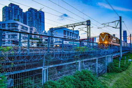 Landscape view of a moving trainのeditorial素材