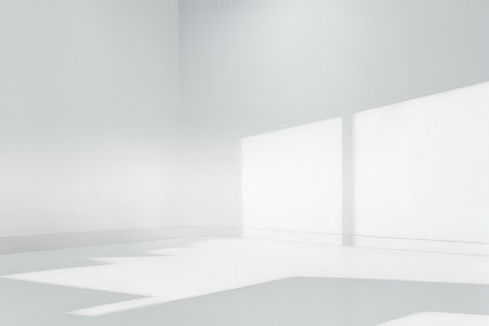 Abstract white studio background for product presentation. Empty room with shadows of window. Display product with blurred backdrop.の写真素材
