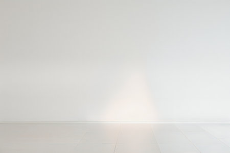 Abstract white studio background for product presentation. Empty room with shadows of window. Display product with blurred backdrop.の写真素材