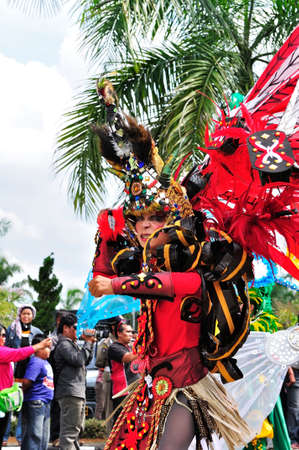 Tenggarong, Indonesia - October 27th, 2012: carnival with unique costumes on public roads within distance 4 km  and is held every year in east borneo indonesiaのeditorial素材