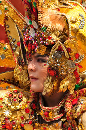 Tenggarong, Indonesia - October 26th, 2013: carnival with unique costumes on public roads within distance 4 km  and is held every year in east borneo indonesiaのeditorial素材