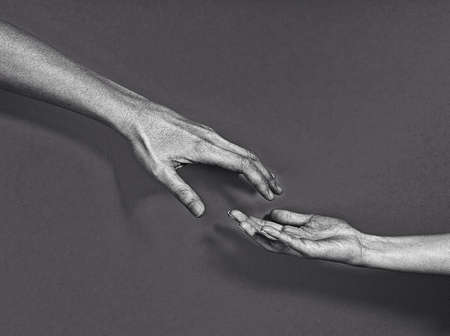 Two hands reaching out.の素材