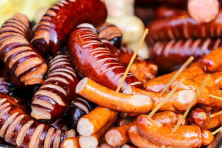 Grilled delicious sausages, close up.  Street food.の写真素材