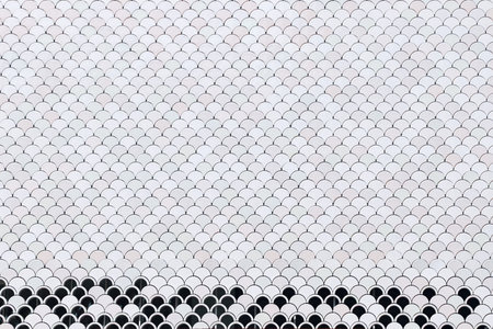 Decorative shell tiles on the wall.