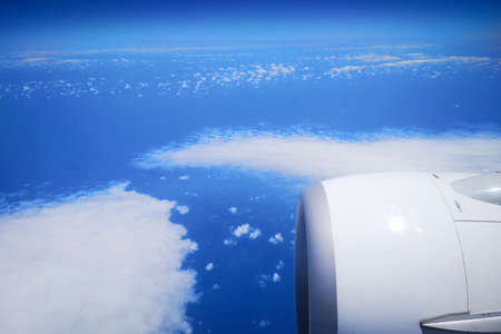 White sky view from the airplane window.の写真素材