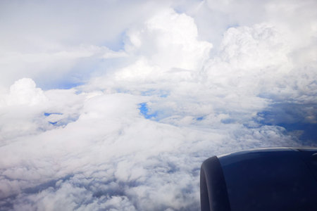 White clouds view from the airplane window.