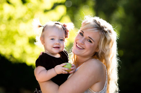 beautiful happy mother and baby daughter