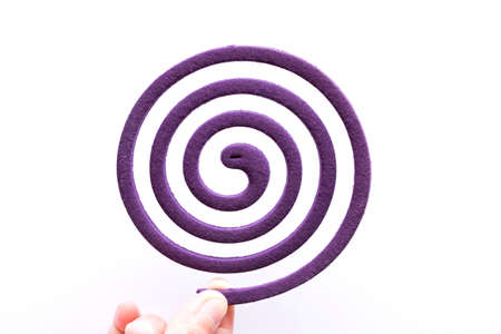 Hand hold Mosquito Repellent white backgroundの写真素材